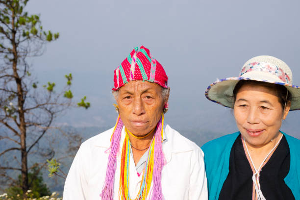 Doi Luang Chiang Dao mountain hills in Chiang Mai, Thailand.couple on a trip in the mountains camping during rain season with mist and fog at sunrise