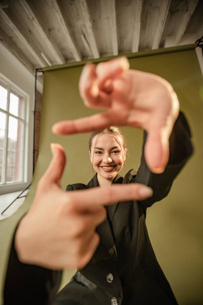 istock Creative photography studio with woman framing hands 2194222548