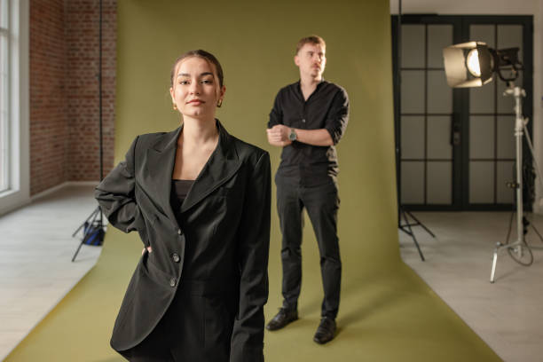 istock Fashionable duo in artistic studio photography setup. 2194223066