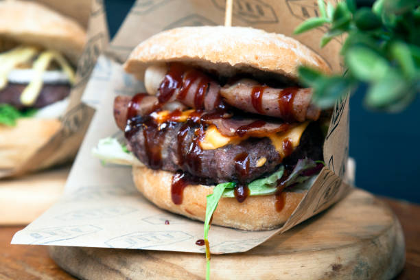 istock Big tasty beef burger full of fresh vegetable 2194224510