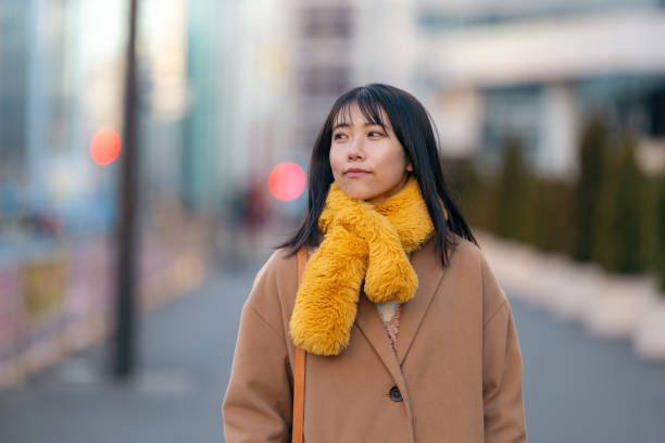 istock Young female freelance worker walking in city 2194224897