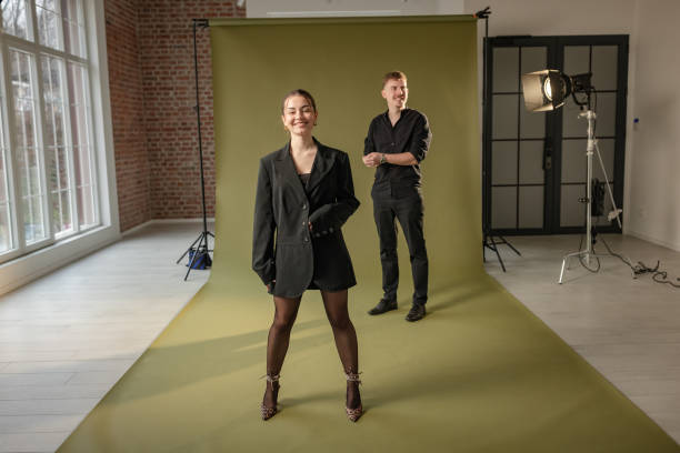 istock Model in oversized blazer poses during photoshoot 2194225323