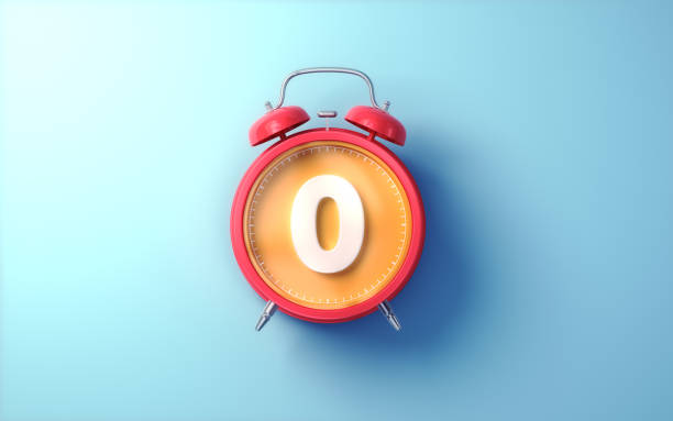 istock Red Alarm Clock with Orange Inside and White Digit 0 on Light Blue Soft Background 2194225480