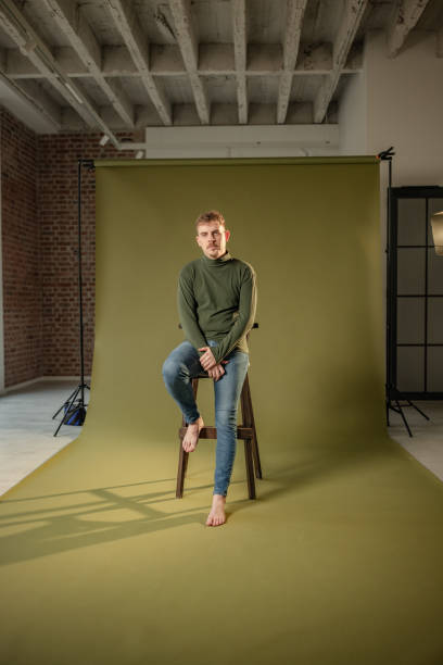 istock Model ready for a portrait in a bright photo studio. 2194225672
