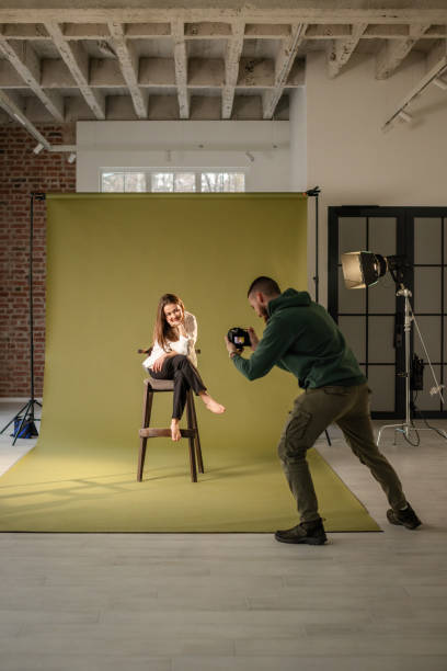 istock Photographer and model interacting during photo shoot 2194227479