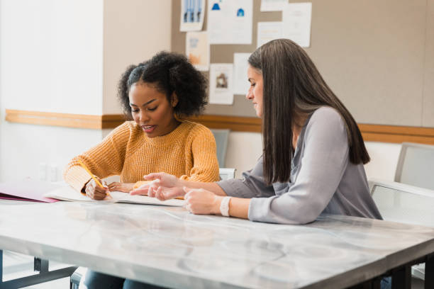 istock Two Women Collaborating on a Project, Discussing Ideas 2194233420