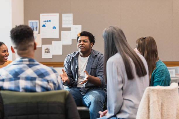 istock Multiracial Group Therapy Session: Young Adults Discussing Mental Health 2194233524