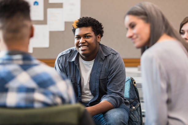 istock Multiracial young adult in group therapy session 2194233537