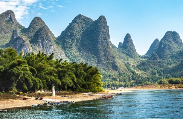 istock Guilin: Li river flows among majestic karst mountains and trees. China 2194235907