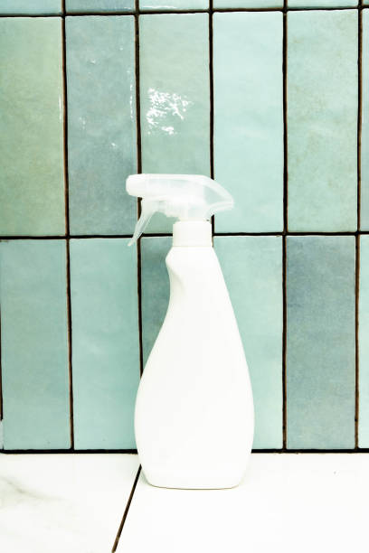 istock Applying epoxy grout adhesive to tiled surfaces for durable repairs in a modern bathroom setting 2194237476