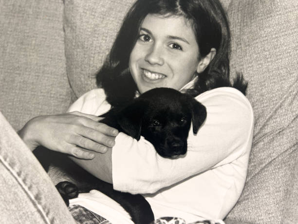 istock Girl with Puppy 2194240998