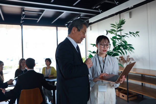 istock Diverse Business people Work Together Use AI In A Modern Office 2194243294