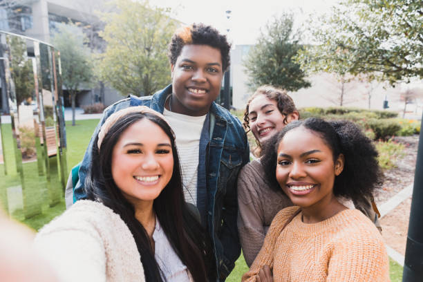 istock Happy Multiracial College Students Taking a Selfie Outdoors 2194243747