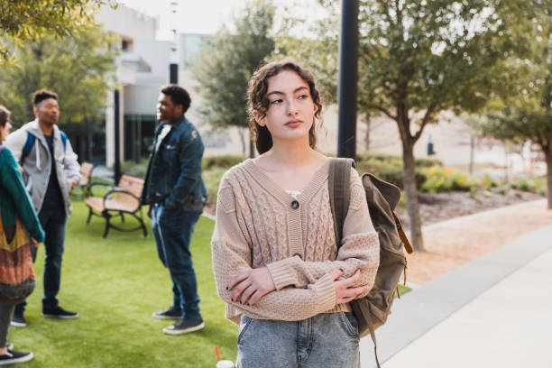 istock Thoughtful Young Woman Student on College Campus 2194243759