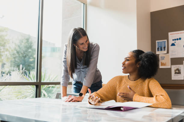 istock Two Women Talking, Casual Meeting, Office Interior 2194243762