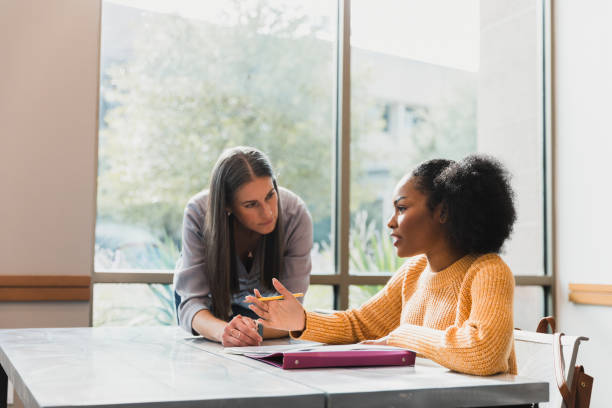 istock Two Women Collaborating on Project, Casual Meeting 2194243770
