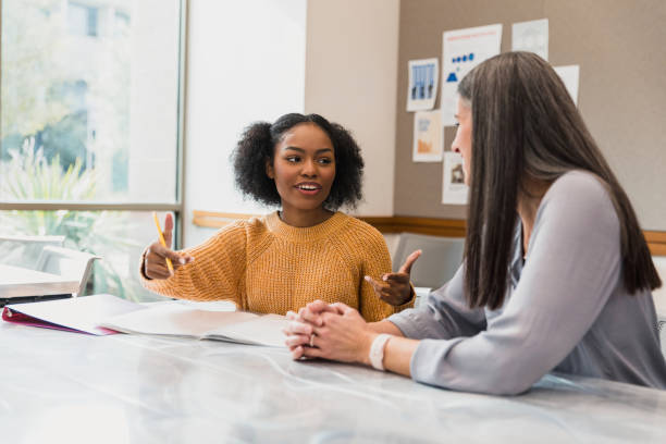 istock Two Women in Discussion, Casual Meeting, Teamwork 2194243774