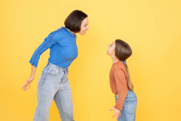 istock Mother and daughter share a loving moment in a bright backdrop 2194244641