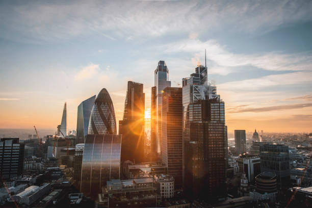 istock Sunlight Glowing Through Skyscrapers in London, England, UK 2194248590
