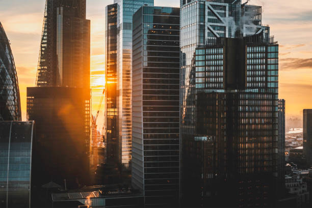 istock Sunlight Piercing Through London Skyscrapers at Sunset, England, UK 2194248623