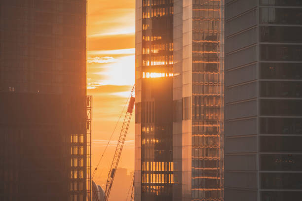 istock Cranes Framed by Skyscrapers at Sunset in London, UK 2194248628