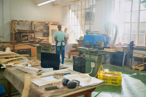 istock Visually impaired men in wood shop 2194250353