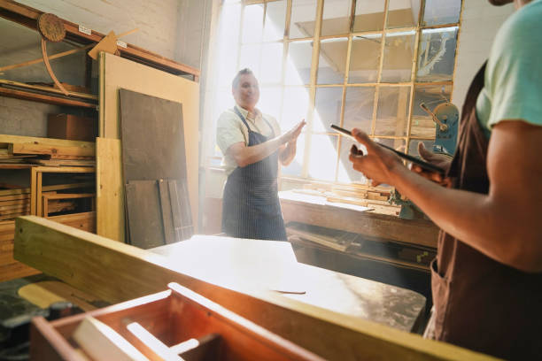 istock Visually impaired men in wood shop 2194250595
