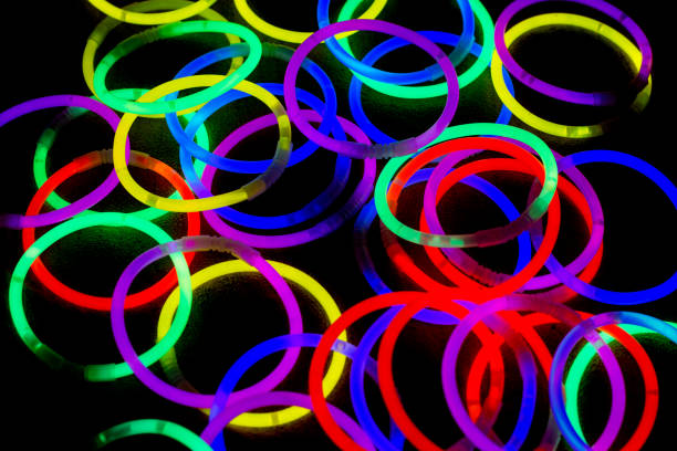 istock Colorful light sources enclosed in plastic rings on a dark background 2194250933