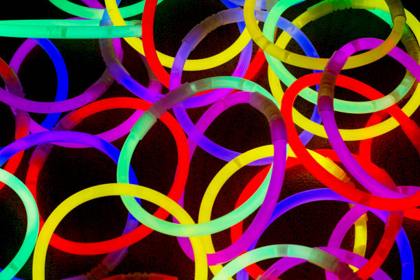 istock Chemical glow circles in rainbow colors on a black background 2194251036