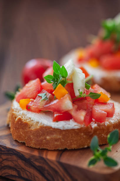 istock Homemade Italian bruschetta on a rustic wooden table 2194251426