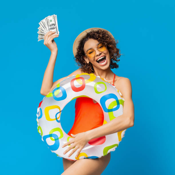 Summer Fun With Money and a Colorful Float at a Pool Party