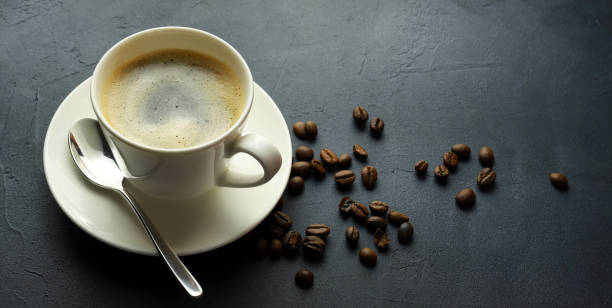 istock Cup of coffee and beans coffee. 2194254473