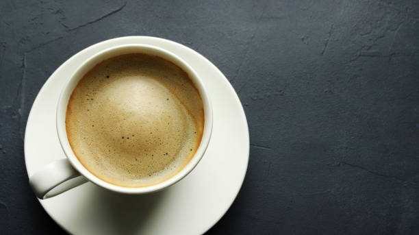 istock Cup of coffee and beans coffee. 2194254498