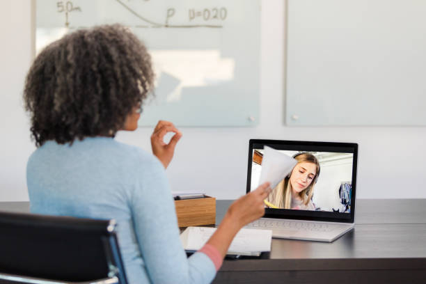 Online Counseling Session:  Virtual Therapy Meeting on Laptop