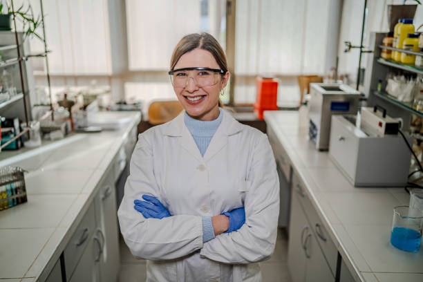 istock Young successful female worker of scientific lab 2194259939