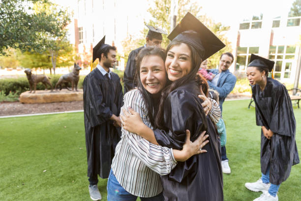 istock Happy Graduate Hugging Mother After Graduation Ceremony 2194268890