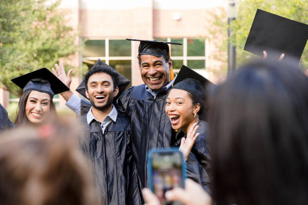 istock Happy Graduates Celebrating Success at University 2194268935