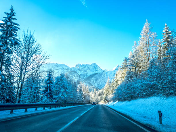 istock Mountain road in winter in Austrian Alps with snow 2194277241