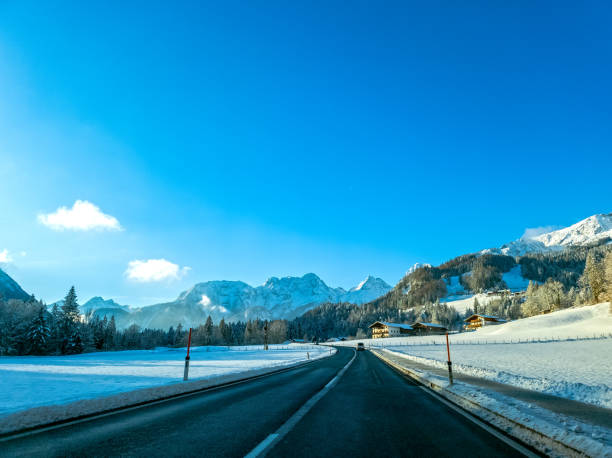istock Mountain road in winter in Austrian Alps with snow 2194277242