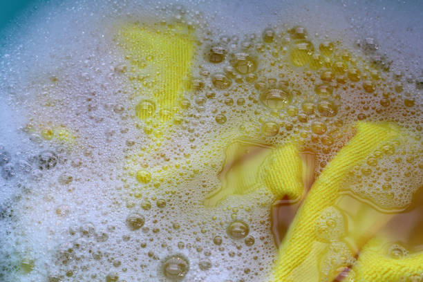 Soak a yellow cloth in a water-soluble laundry detergent.