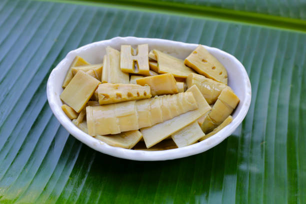Closeup of fresh sugarcane stalks for sale at a Mexican market, raw cane texture background
