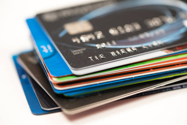 Macro low key credit card or debit card background with selective focus on microchip