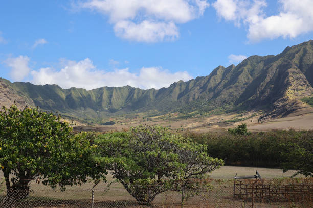 The magnificent Waianae valley on the island of Oahu, Hawaii.  This view illustrates a typical topography of a volcanic island covered in lush tropical forests.