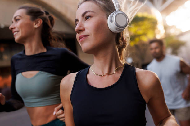 istock Friends running together 2194290483