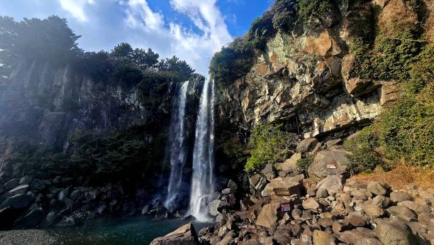 istock Judging Wterfall in Jeju Island 2194290689