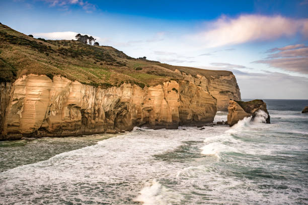 istock Tunnel Beach rock formation with waves under the archway 2194294274