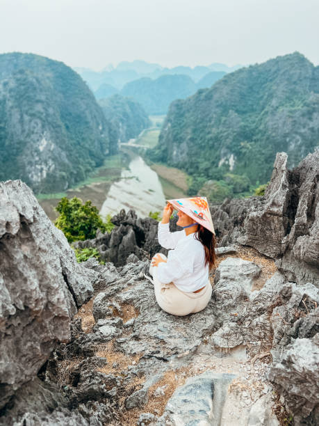 istock Woman Enjoying Scenic Mountain View in Nature 2194295949