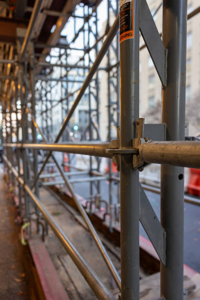 istock Scaffolding Over City Sidewalk 2194300040