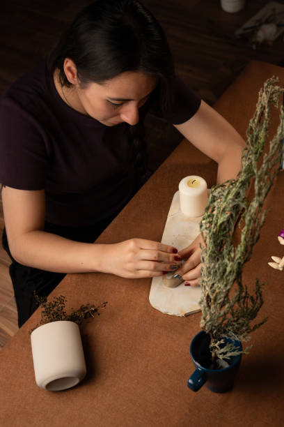 istock Young woman sculpting a sculpture. Craftsmanship 2194300055
