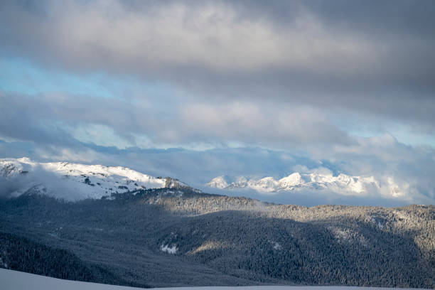 Scenic view of coastal mountains in winter, moody light, B.C. Coast Ranges